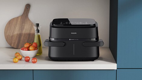 Der Philips Airfryer Flexible Basket 1000 Series kreiert eine extragroße Portion oder zwei Gerichte gleichzeitig